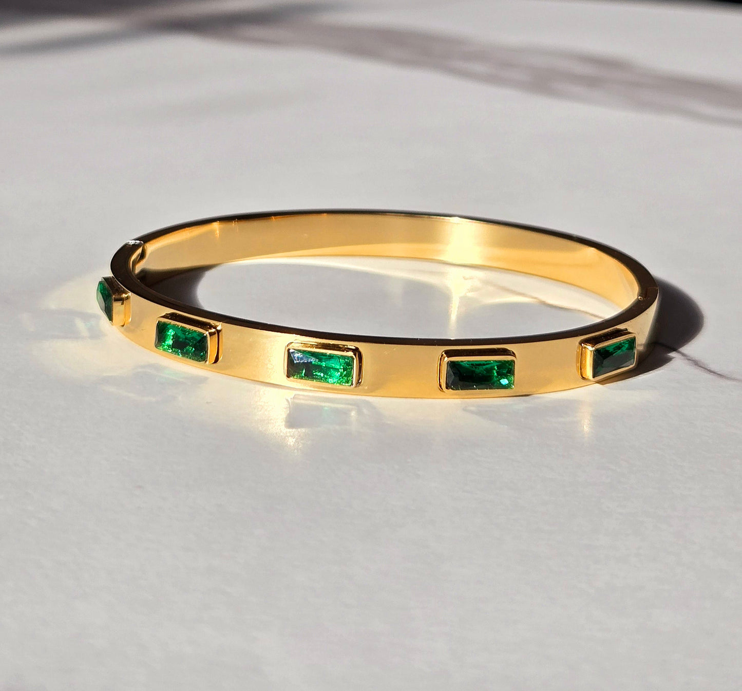Emerald Elegance Gold Bangle
