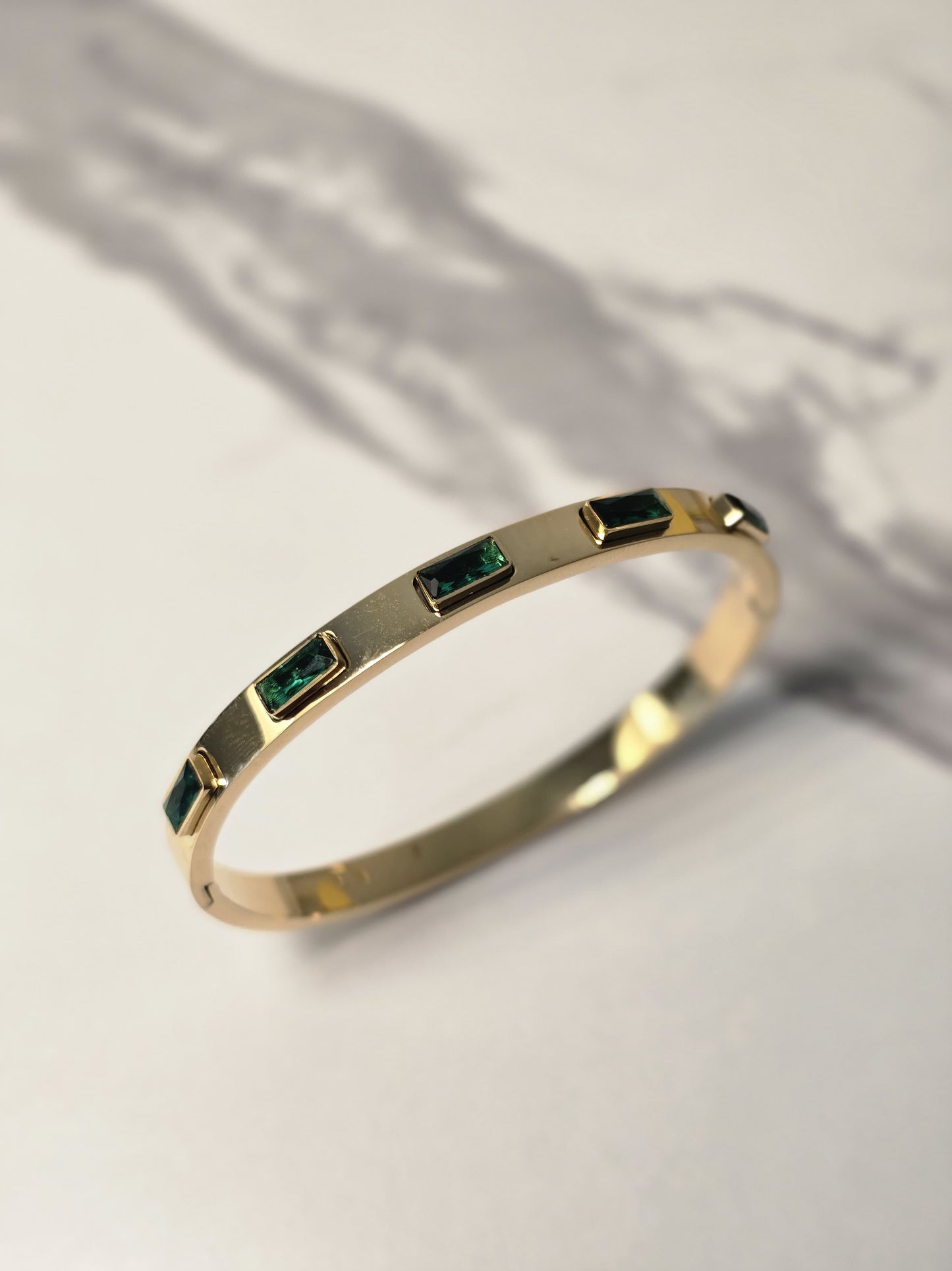 Emerald Elegance Gold Bangle